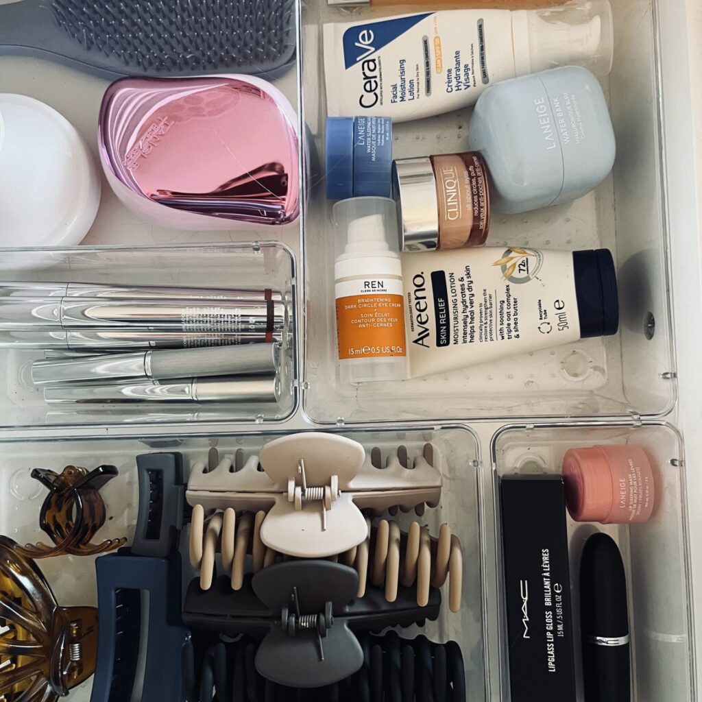 Organised vanity drawers with makeup and brush storage trays