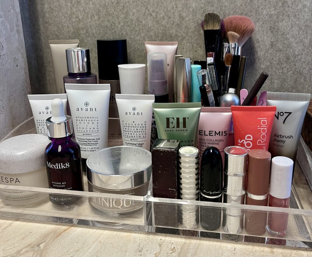 Acrylic surface vanity organiser with makeup and perfume trays